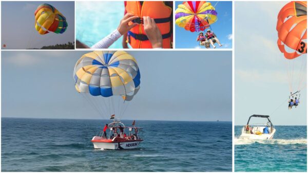 Colorful parasail floats above sparkling Baga Beach as thrill-seekers enjoy an aerial view of Goa’s coastline