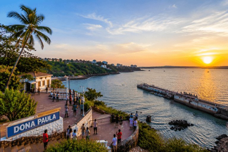 Dona Paula Goa sea view point with jetty visitors sunset light palm tree coastal hills and Arabian Sea view near Panjim