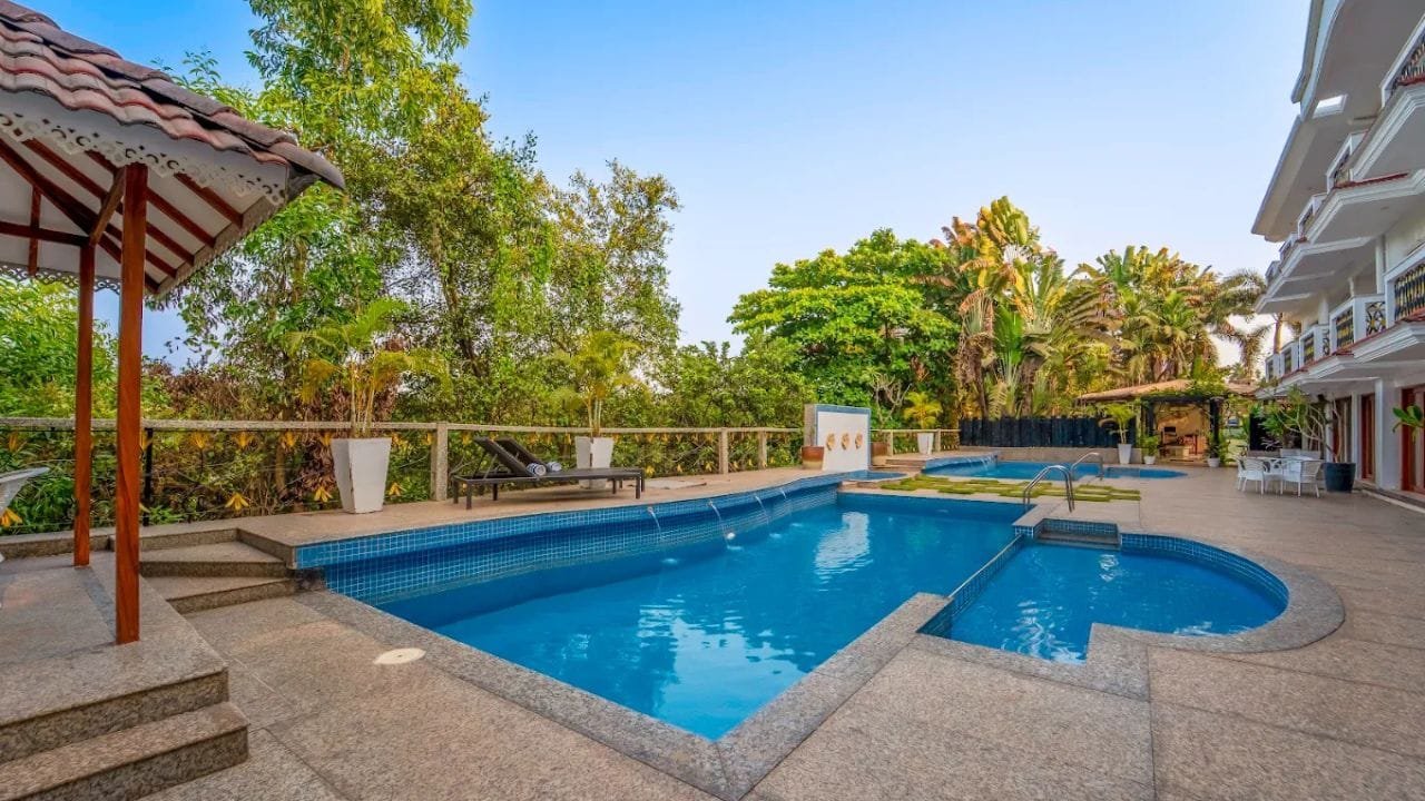 White Pearl Suites by Rosetum Arpora Goa swimming pool