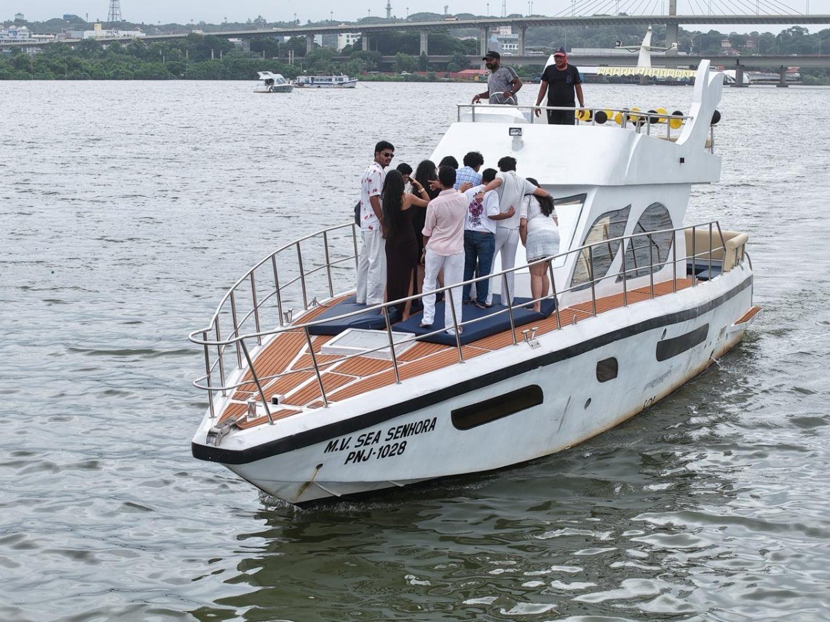 Guests enjoying a private party on the front deck of MV Sea Senhora yacht in Goa